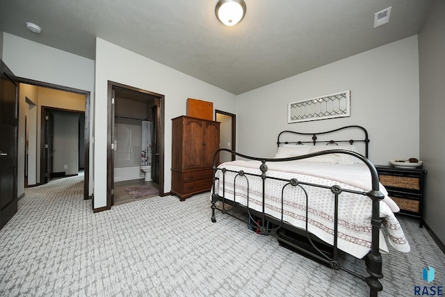 7905 S Brande Park Cir, Sioux Falls, SD 57108 - bedroom with light carpet and ensuite bath