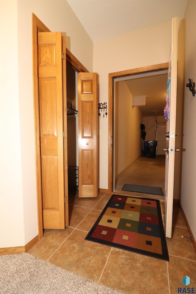 5708 S Shadow Wood Pl, Sioux Falls, SD 57108 - hall featuring baseboards and tile patterned flooring
