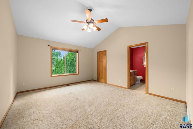 4912 E 42nd St, Sioux Falls, SD 57110 - unfurnished bedroom with lofted ceiling, light carpet, ensuite bathroom, and a ceiling fan