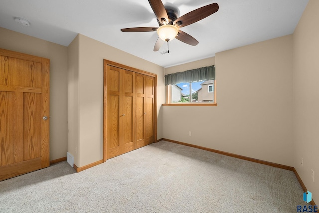 4912 E 42nd St, Sioux Falls, SD 57110 - unfurnished bedroom featuring carpet flooring, a closet, and a ceiling fan
