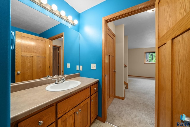 4912 E 42nd St, Sioux Falls, SD 57110 - bathroom with vanity and baseboards