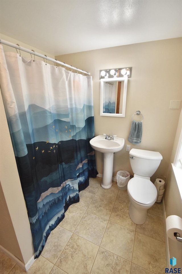 1620 S W Ave, Sioux Falls, SD 57105 - full bathroom with tile patterned floors and curtained shower