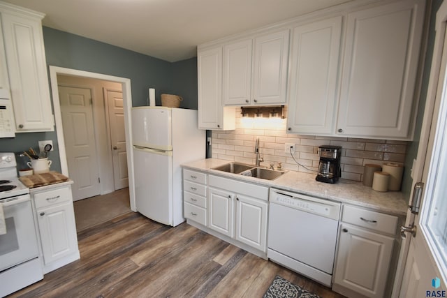1620 S W Ave, Sioux Falls, SD 57105 - kitchen with white appliances, dark wood finished floors, white cabinetry, and backsplash