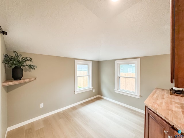 340 N Juniper Ave, Parker, SD 57053 - interior space featuring a textured ceiling and light wood-style flooring