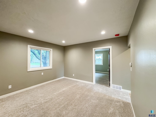 340 N Juniper Ave, Parker, SD 57053 - spare room with light carpet and recessed lighting