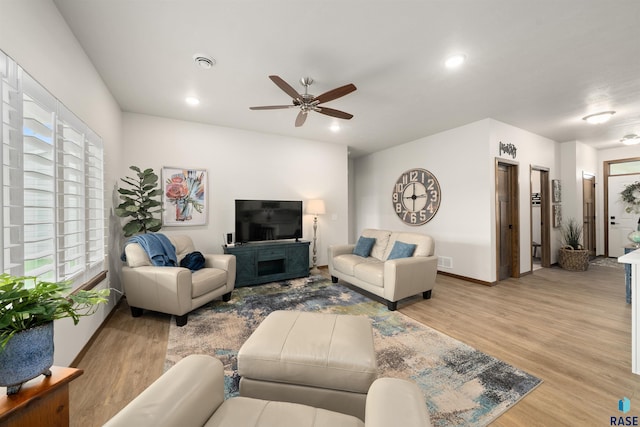 5402 S Bahnson Ave, Sioux Falls, SD 57108 - living room with wood finished floors, ceiling fan, and recessed lighting