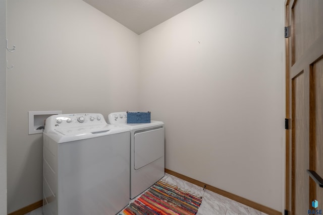 5402 S Bahnson Ave, Sioux Falls, SD 57108 - laundry room with washer and clothes dryer and baseboards