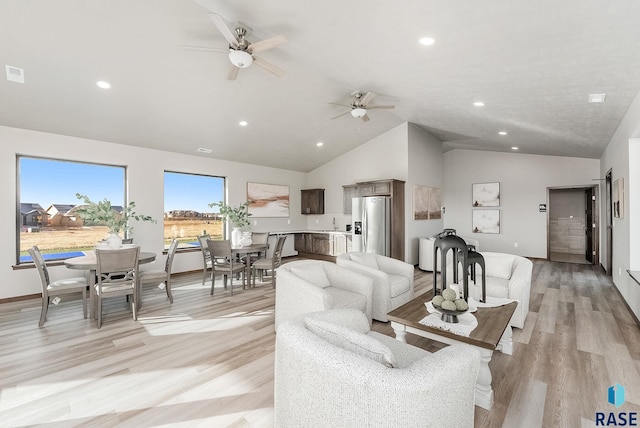 1201 E Wayne Pl, Tea, SD 57064 - living area with vaulted ceiling, ceiling fan, recessed lighting, and light wood finished floors