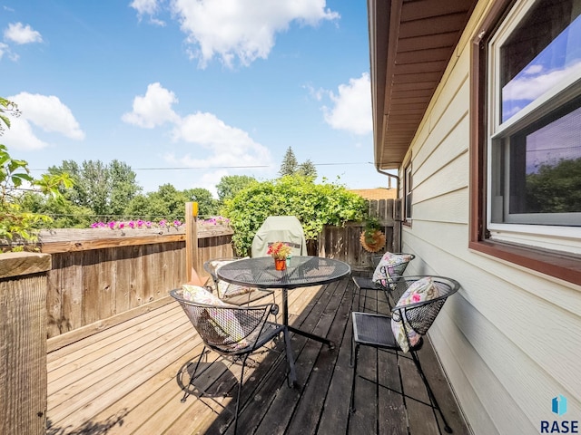 3112 E 15th St, Sioux Falls, SD 57103 - wooden terrace featuring outdoor dining area