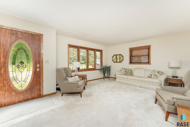 3112 E 15th St, Sioux Falls, SD 57103 - living room featuring baseboards and light carpet