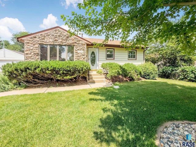 3112 E 15th St, Sioux Falls, SD 57103 - ranch-style home with a front lawn and stone siding