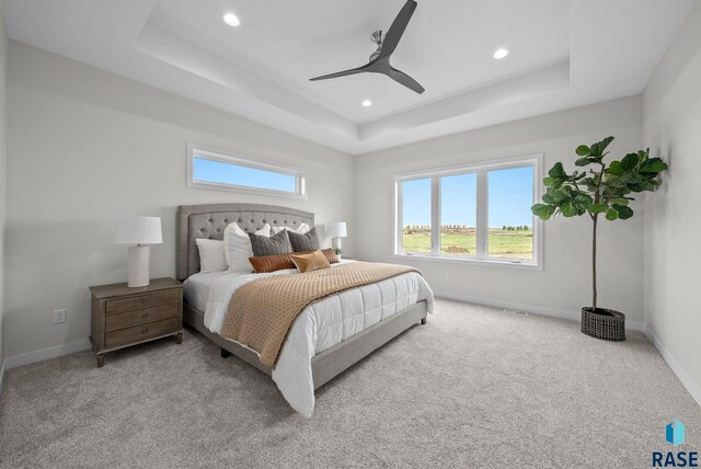 5601 E Morningside Cir, Sioux Falls, SD 57110 - bedroom featuring a raised ceiling, recessed lighting, carpet floors, and ceiling fan