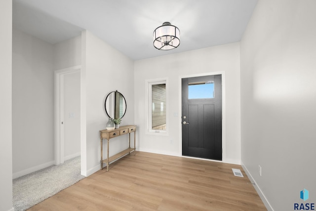 5601 E Morningside Cir, Sioux Falls, SD 57110 - entryway with light wood-type flooring and baseboards