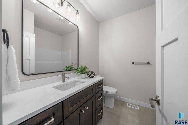 5601 E Morningside Cir, Sioux Falls, SD 57110 - full bathroom featuring vanity and toilet