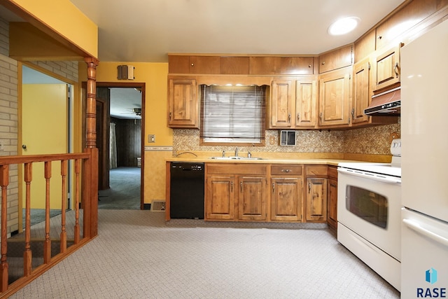 2312 E 19th St, Sioux Falls, SD 57103 - kitchen with white appliances, light carpet, light countertops, and tasteful backsplash
