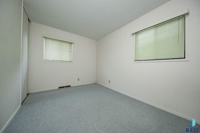 2312 E 19th St, Sioux Falls, SD 57103 - carpeted spare room with healthy amount of natural light