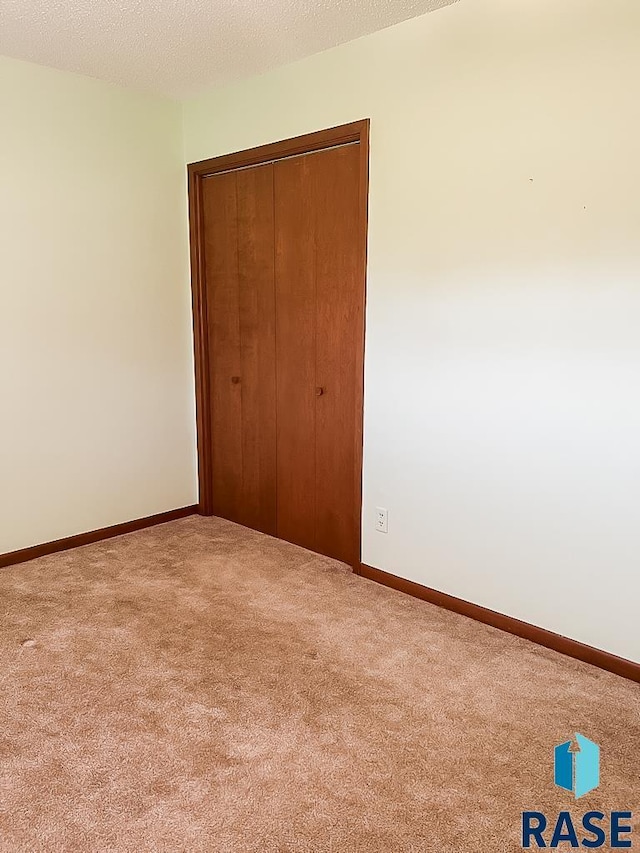 515 151st St, Luverne, MN 56156 - spare room with carpet and baseboards
