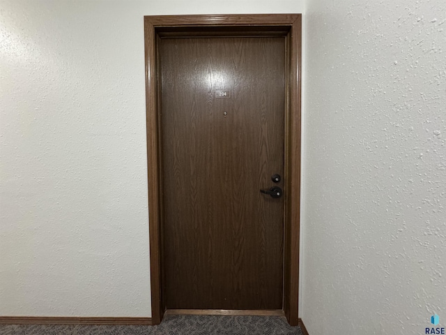 3552 S Gateway Blvd Unit 204, Sioux Falls, SD 57106 - entryway featuring carpet flooring and baseboards