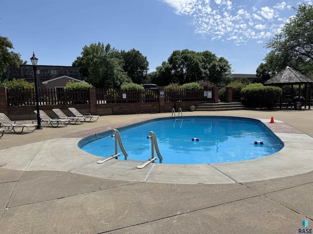 3552 S Gateway Blvd Unit 204, Sioux Falls, SD 57106 - view of pool featuring a patio area and a gazebo