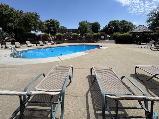3552 S Gateway Blvd Unit 204, Sioux Falls, SD 57106 - community pool featuring a patio area and a gazebo