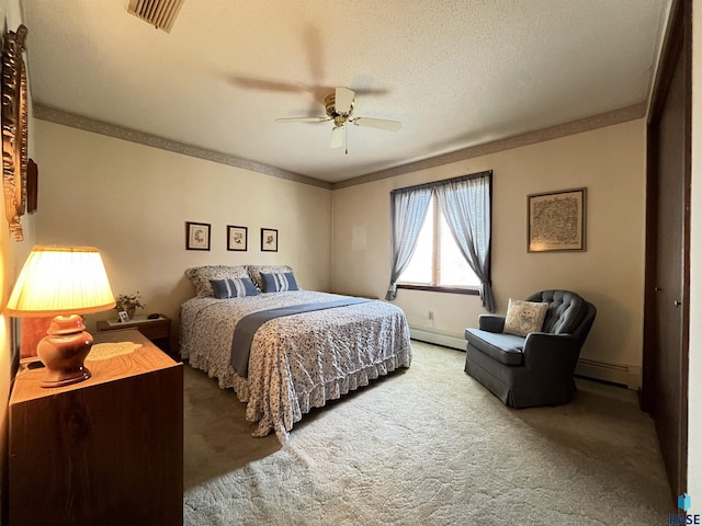 3552 S Gateway Blvd Unit 204, Sioux Falls, SD 57106 - bedroom with carpet flooring, a baseboard heating unit, crown molding, and ceiling fan