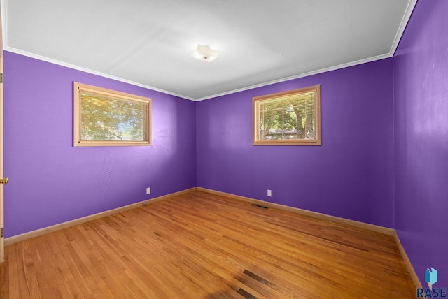 1615 E 32nd St, Sioux Falls, SD 57105 - unfurnished room featuring light wood-style flooring and ornamental molding