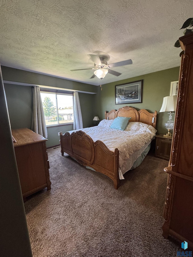 6509 S Tomar Rd Unit 3, Sioux Falls, SD 57108 - carpeted bedroom featuring a textured ceiling and ceiling fan