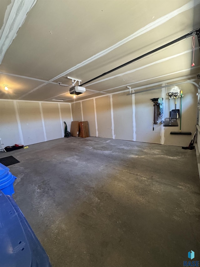 6509 S Tomar Rd Unit 3, Sioux Falls, SD 57108 - garage featuring a garage door opener
