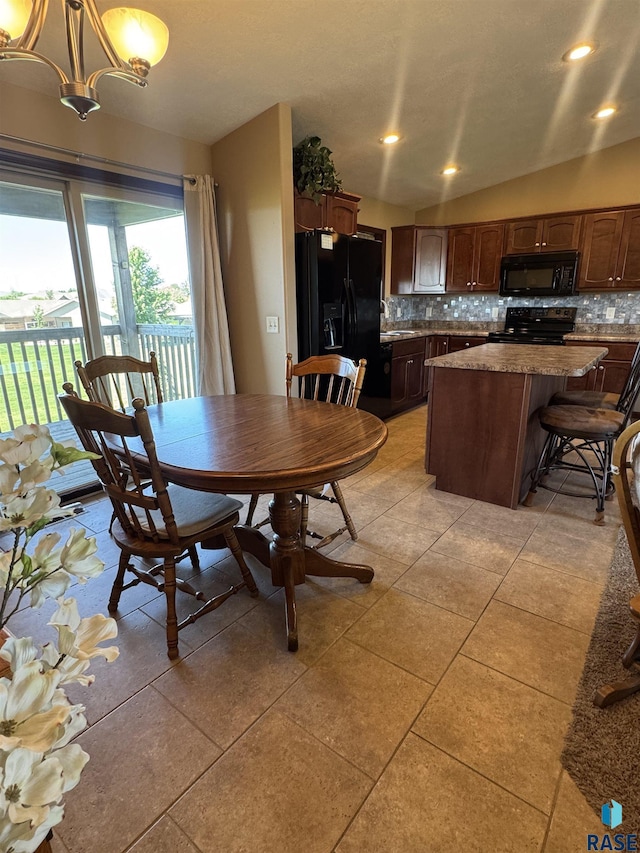 6509 S Tomar Rd Unit 3, Sioux Falls, SD 57108 - dining room with light tile patterned floors, a chandelier, and recessed lighting