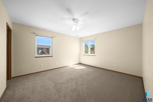 1418 E Redwood Blvd, Brandon, SD 57005 - unfurnished room with ceiling fan and carpet flooring