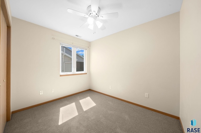 1418 E Redwood Blvd, Brandon, SD 57005 - carpeted spare room with baseboards and a ceiling fan