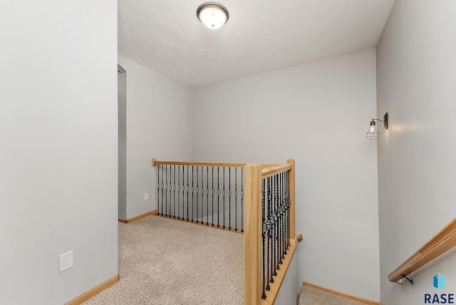 635 E Brian St, Tea, SD 57064 - corridor featuring an upstairs landing and carpet flooring