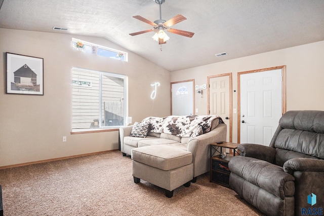 3604 W 93rd St, Sioux Falls, SD 57108 - living room featuring a ceiling fan, lofted ceiling, light colored carpet, healthy amount of natural light, and a textured ceiling