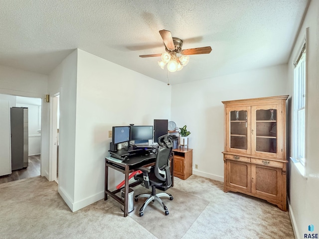 918 W 5th St, Sioux Falls, SD 57104 - office area featuring light carpet, a ceiling fan, and a textured ceiling