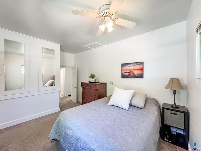 918 W 5th St, Sioux Falls, SD 57104 - carpeted bedroom with baseboards and ceiling fan
