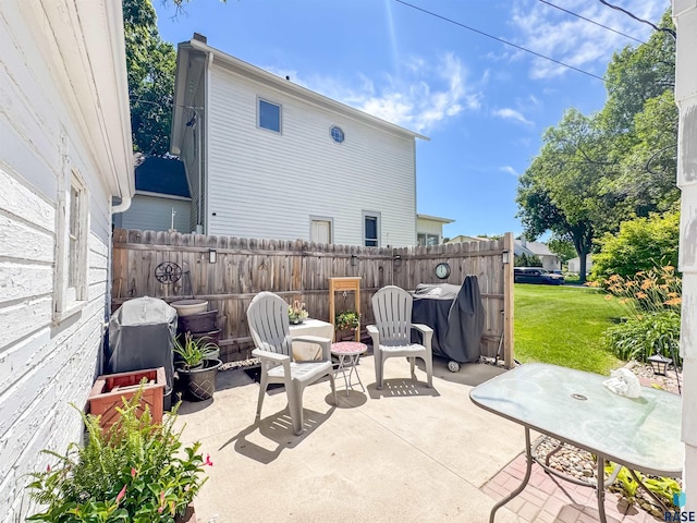 918 W 5th St, Sioux Falls, SD 57104 - view of patio featuring grilling area