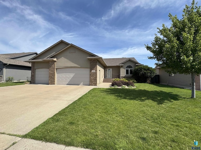 3908 W 89th St, Sioux Falls, SD 57108 - single story home featuring brick siding, an attached garage, concrete driveway, and a front yard