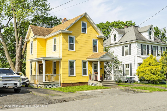 53 Broad St, Catskill, NY 12414 - view of front of property featuring a porch and roof with shingles