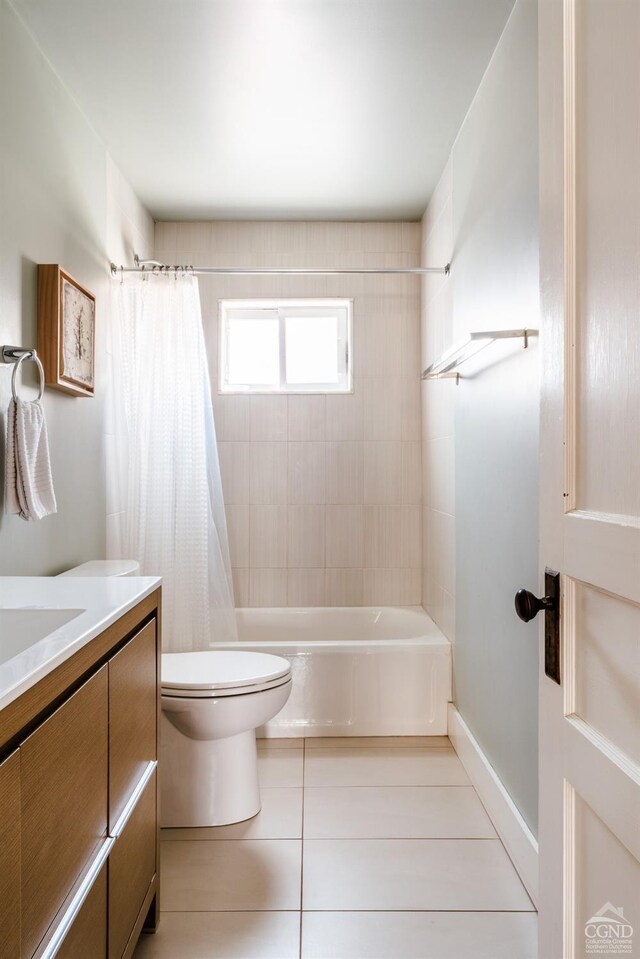 705 Warren St, Hudson, NY 12534 - bathroom with toilet, shower / bathtub combination with curtain, tile patterned floors, and vanity