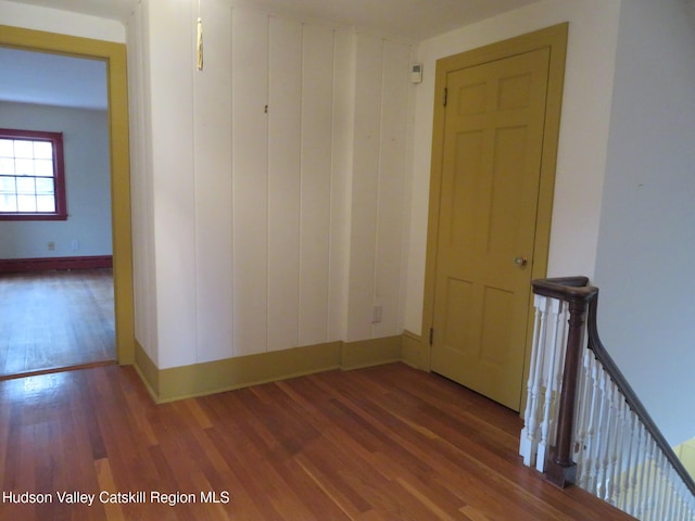 unfurnished room featuring hardwood / wood-style flooring