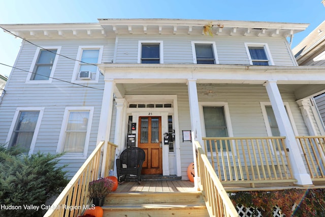 entrance to property with a porch