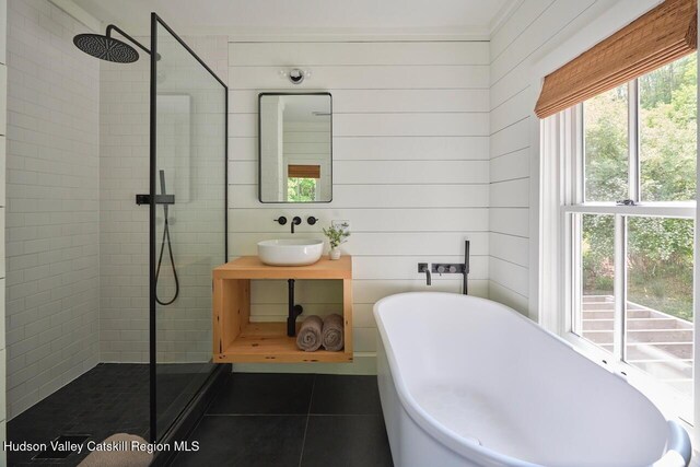 1556 Gulf Rd, Callicoon Center, NY 12724 - bathroom with a walk in shower, tile patterned floors, a soaking tub, and vanity