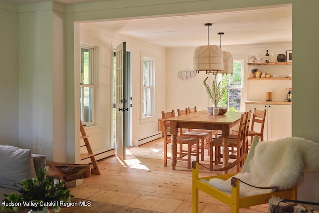 1556 Gulf Rd, Callicoon Center, NY 12724 - dining room featuring light wood finished floors and baseboard heating