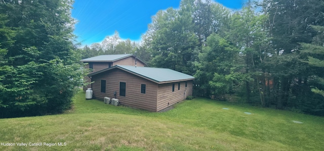 69 June Lodge Dr, Hunter, NY 12442 - view of property exterior with a yard and a metal roof
