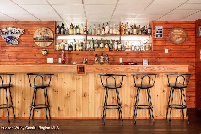 214 Wright Rd, Kerhonkson, NY 12446 - indoor bar with a drop ceiling, dark wood-type flooring, and wood walls