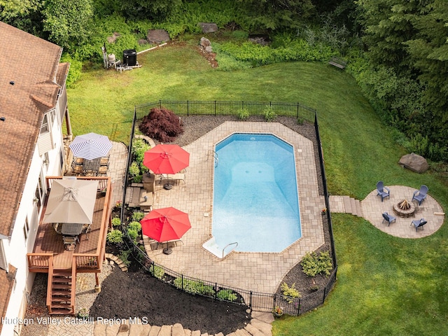 214 Wright Rd, Kerhonkson, NY 12446 - view of swimming pool featuring a wooden deck, a fenced backyard, a patio, and outdoor dining area