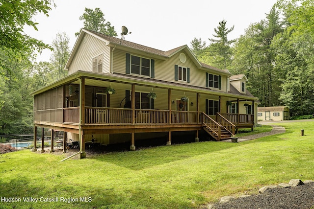 214 Wright Rd, Kerhonkson, NY 12446 - farmhouse inspired home with a front yard, an outbuilding, roof with shingles, and a porch