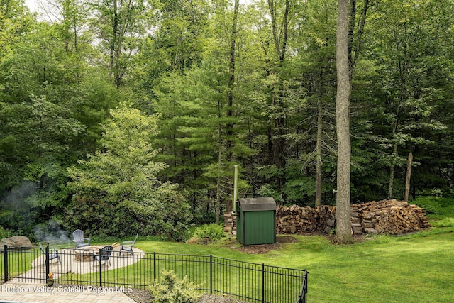 214 Wright Rd, Kerhonkson, NY 12446 - view of yard with a storage shed and a wooded view