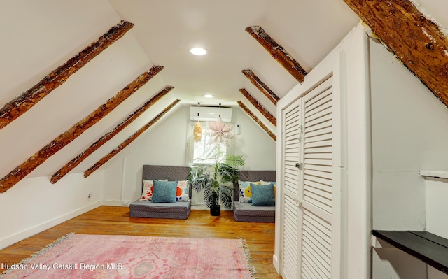 sitting room featuring recessed lighting, a wall mounted AC, wood finished floors, and lofted ceiling