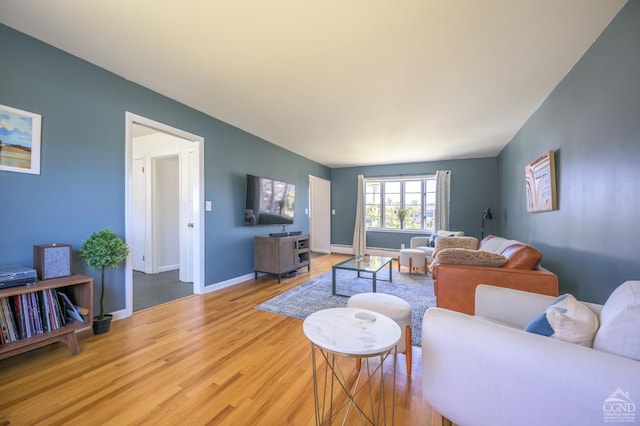 25 Joslen Pl, Hudson, NY 12534 - living room featuring wood finished floors and baseboards